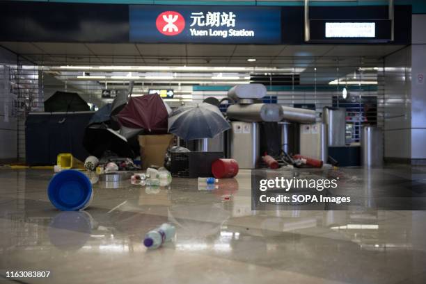 View of the MTR station entrance from the outside after protesters have left. Anti-government protesters held a silent assembly in Yuen Long to mark...