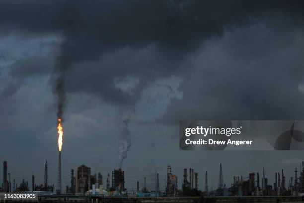 Gas flare from the Shell Chemical LP petroleum refinery illuminates the sky on August 21, 2019 in Norco, Louisiana. Located about 10 miles up the...