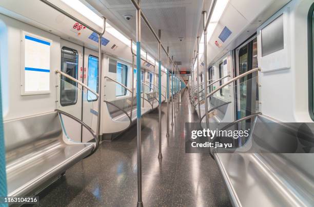 wuhan, metro line 2, inside the empty carriage. - railroad car stock-fotos und bilder