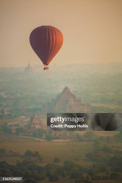 ballooning in bagan - bagan stock pictures, royalty-free photos & images