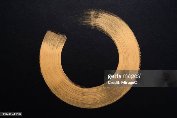 gold colored sumi circle - gold circle 個照片及圖片檔