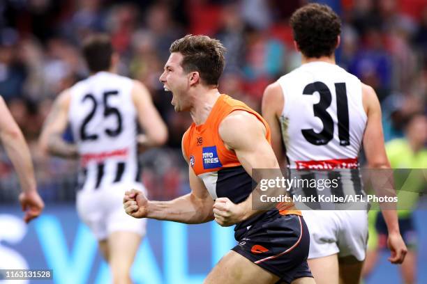 Toby Greene of the Giants celebrates kicking a goal during the Greater Western Sydney Giants and the Collingwood Magpies at GIANTS Stadium on July...