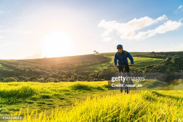 achieving goals in life. - winter cycling stock pictures, royalty-free photos & images