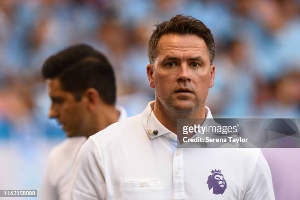 Ex Newcastle and England Striker Michael Owen looks on during the Premier League Asia Trophy match between Newcastle United and West Ham United at...