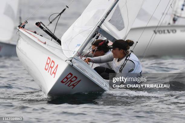 Brazil's Fernanda Oliveira and Ana Barbachan compete in the women's two person dinghy 470 class competition in a sailing test event for the Tokyo...