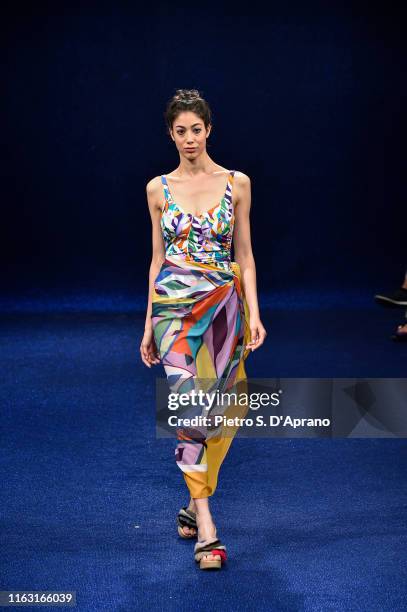 Model walks the runway during the Maredamare 2019 - Roidal - Beach Invaders fashion show at Fortezza Da Basso on July 20, 2019 in Florence, Italy.