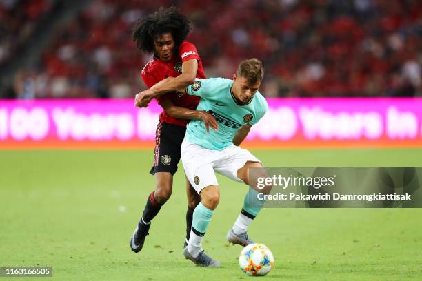 Nicolo Barella of FC Internazionale controls the ball under pressure of Tahith Chong of Manchester United during the 2019 International Champions Cup...