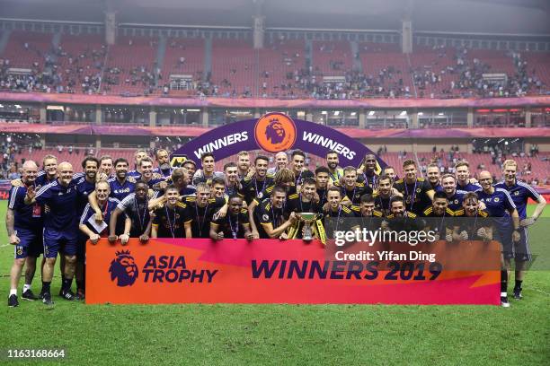 Team Wolverhampton Wanderers pose for a group shot during podium ceremony of Premier League Asia Trophy Final between Manchester City and...
