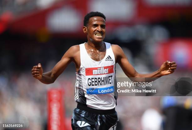 Hagos Gebrhiwet of Ethiopia celebrates victory in the Men's 5000m during Day One of the Muller Anniversary Games IAAF Diamond League event at the...