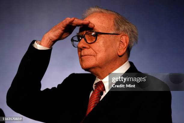 Warren Buffett, Chairman of Berkshire Hathway and Trustee of Bill and Melinda Gates Foundation during the press conference at the Hotel Oberoi on...