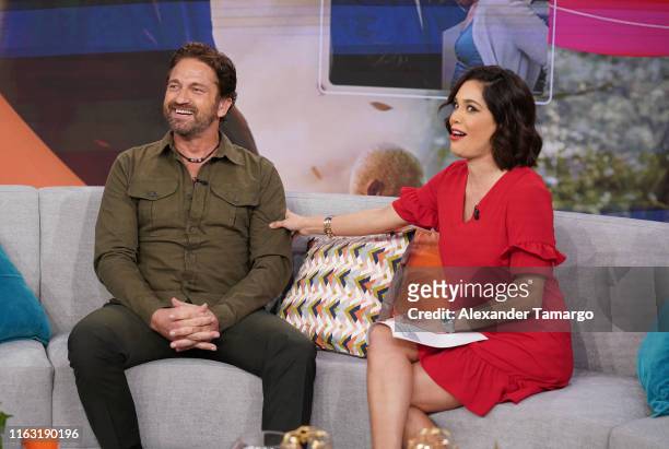 Gerard Butler and Karla Martinez are seen on the set of Despierta America at Univision Studios to promote the film "Angel Has Fallen" on August 22,...