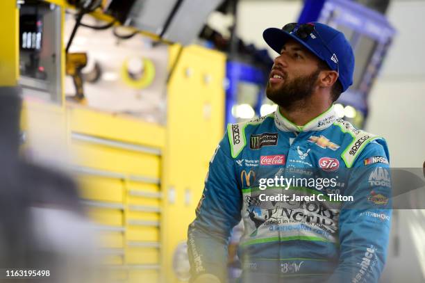 Bubba Wallace, driver of the Victory Junction Chevrolet, looks on during practice for the Monster Energy NASCAR Cup Series Foxwoods Resort Casino 301...