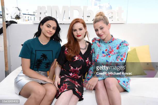 Camila Mendes, Madelaine Petsch and Lili Reinhart attend the #IMDboat at San Diego Comic-Con 2019: Day Three at the IMDb Yacht on July 20, 2019 in...