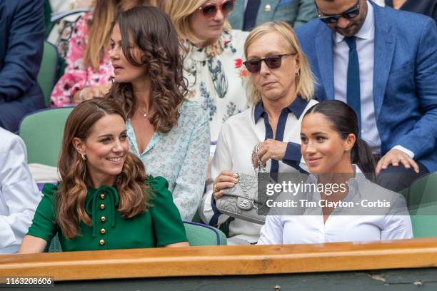 July 13: Catherine, Duchess of Cambridge and Meghan, Duchess of Sussex in the Royal Box on Centre Court along with Martina Navratilova and her spouse...