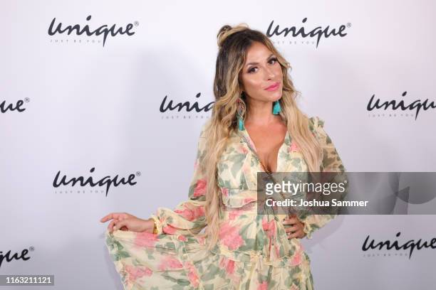 Guelcan Kamps attends the Unique Fashion Show Spring-Summer 2020 at Oceandiva on July 20, 2019 in Dusseldorf, Germany.