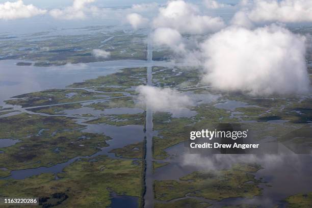 Coastal waters flow through deteriorating wetlands on August 22, 2019 in Plaquemines Parish, Louisiana. The non-profit conservation organization...