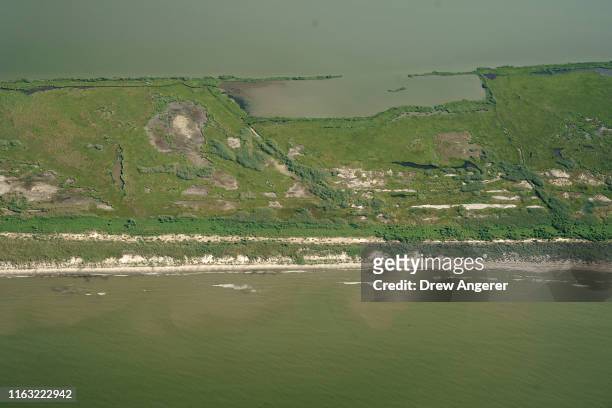 An aerial view of Scofield Island, a recently restored barrier island that stands between the Gulf of Mexico and Bataria Bay on August 22, 2019 in...