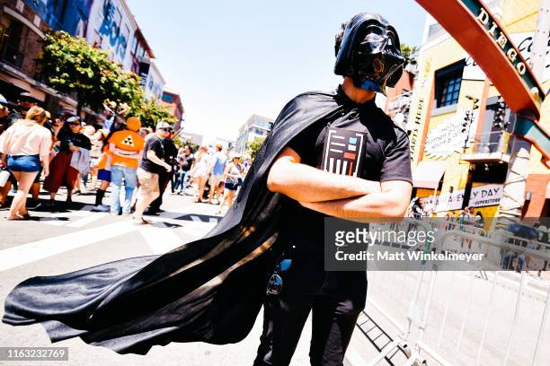 Cosplayer dressed as Darth Vader attend the 2019 Comic-Con International on July 20, 2019 in San Diego, California.