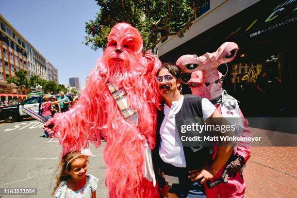 Cosplayers attend the 2019 Comic-Con International on July 20, 2019 in San Diego, California.