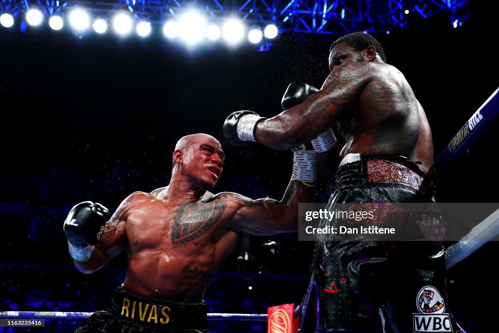 Oscar Rivas punches Dillian Whyte during the WBC Interim Title and ...