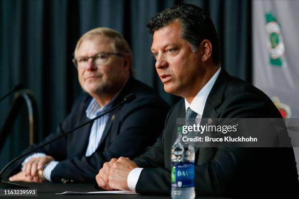 Craig Leipold, owner of the Minnesota Wild, listens as Bill Guerin answers questions from the media as the new general manager for the team at a...