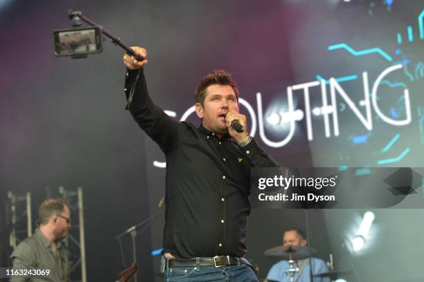 Roy Stride of Scouting For Girls performs live on stage during the second day of Penn Fest at The Big Park on July 20, 2019 in Penn Street,...