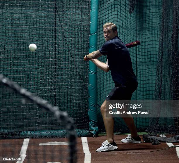 Jason McAteer legend of Liverpool trying baseball a training session at Fenway Park on July 20, 2019 in Boston, Massachusetts.