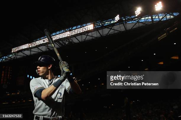 Christian Yelich of the Milwaukee Brewers warms up on-deck during the first inning of the MLB game against the Arizona Diamondbacks at Chase Field on...