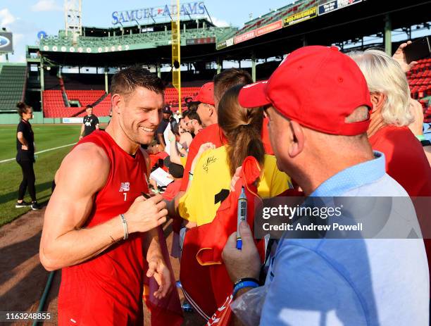 James Milner of Liverpool with fans at the end of the training session at Fenway Park on July 20, 2019 in Boston, Massachusetts.