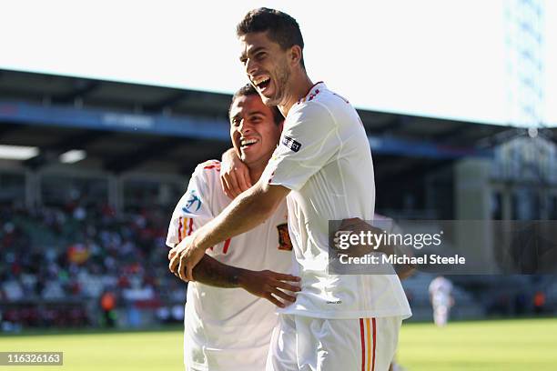 Thiago Alcantara and Didac Vila Rosello celebrate their sides second goal scored by Adrian during the UEFA European Under-21 Championship Group B...