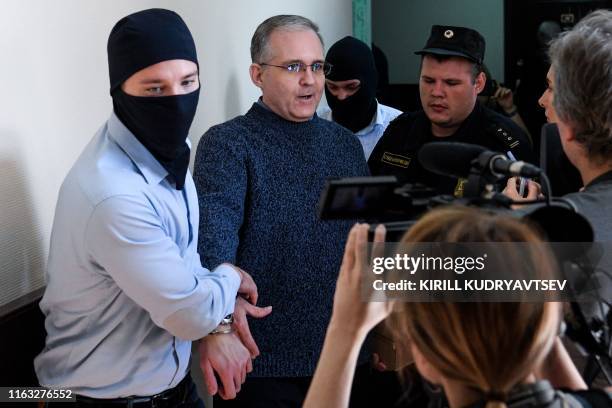 Paul Whelan , a former US Marine accused of spying and arrested in Russia, arrives to attend his hearing at a court in Moscow on August 23, 2019.