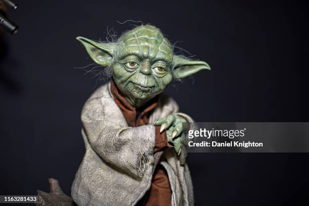 Display statue of Yoda from "Star Wars" at 2019 Comic-Con International on July 20, 2019 in San Diego, California.