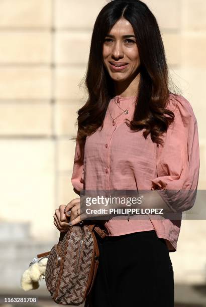 Nobel Peace Prize Nadia Murad arrives at the Elysee presidential palace in Paris on August 23 to take part in a meeting of the G7 Advisory Council...