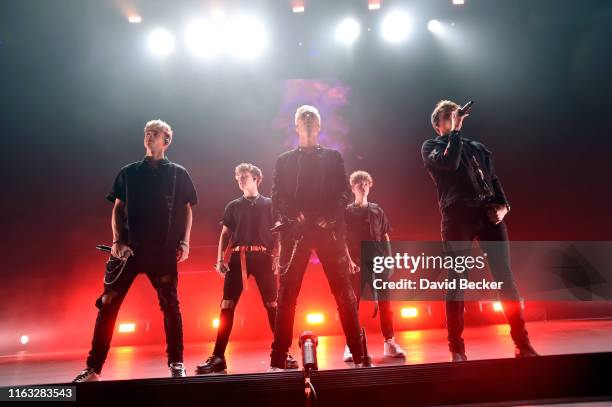 Singers Corbyn Besson, Jack Avery, Daniel Seavey, Zach Herron and Jonah Marais of Why Don't We perform at Park Theater at Park MGM on a stop of the...