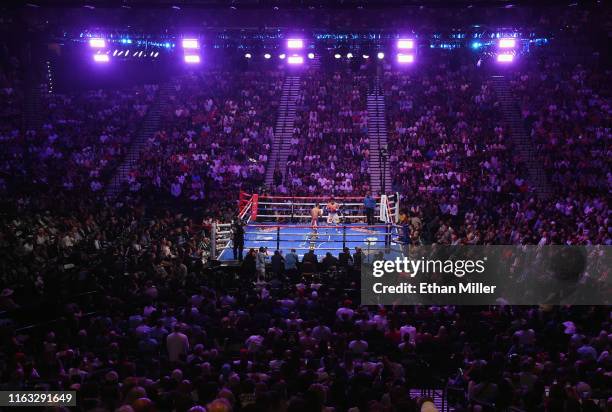 Manny Pacquiao and Keith Thurman battle in the third round of their WBA welterweight title fight at MGM Grand Garden Arena on July 20, 2019 in Las...