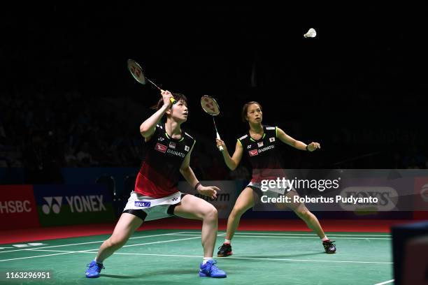 Yuki Fukushima and Sayaka Hirota of Japan compete against Misaki Matsutomo and Ayaka Takahashi of Japan during the Women's Doubles Final match on day...