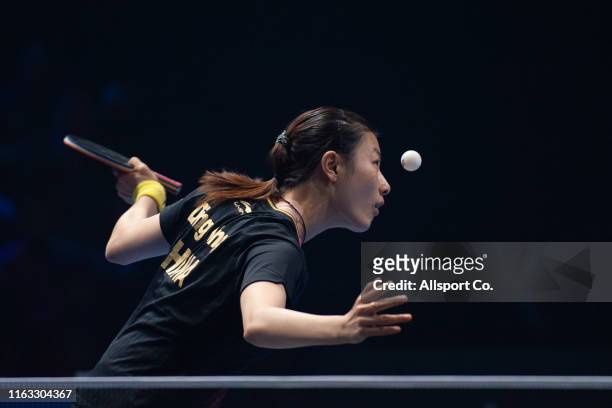 Ding Ning of China plays a shot to Wang Manyu of China in the Women's Singles Semi Finals during the T2 Diamond 2019 Malaysia Table Tennis...