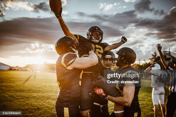 victory on american football match! - team sport celebration stock pictures, royalty-free photos & images