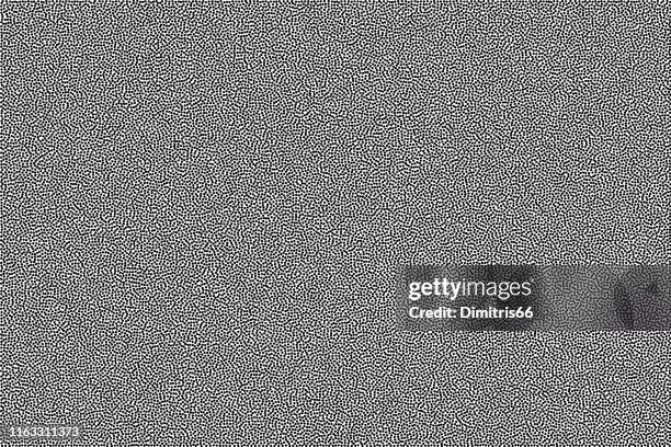 black and white grainy abstract background. halftone - pointillism pattern with random dots. - leather texture stock illustrations