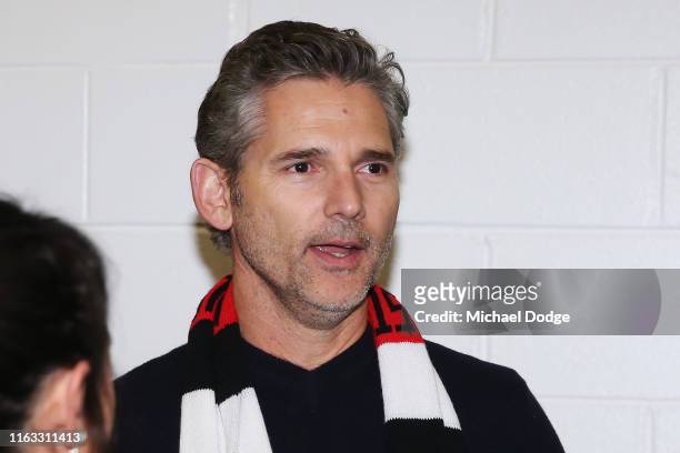 Actor Eric Bana celebrates the win by the Saints during the round 18 AFL match between the St Kilda Saints and the Western Bulldogs at Marvel Stadium...