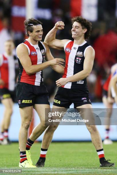 First match winner Nick Coffield of the Saints and Hunter Clark of the Saints celebrates the win during the round 18 AFL match between the St Kilda...