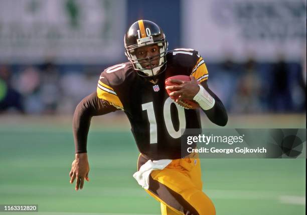 Quarterback Kordell Stewart of the Pittsburgh Steelers runs with the football during a game against the Philadelphia Eagles at Three Rivers Stadium...