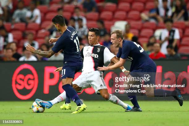Cristiano Ronaldo of Juventus controls the ball against Erik Lamela and Oliver Skipp of Tottenham Hotspur during the International Champions Cup...