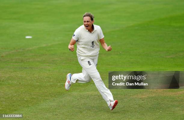 Laura Marsh of England celebrates taking the wicket of Alyssa Healy of Australia during day four of the Kia Women's Test Match between England Women...