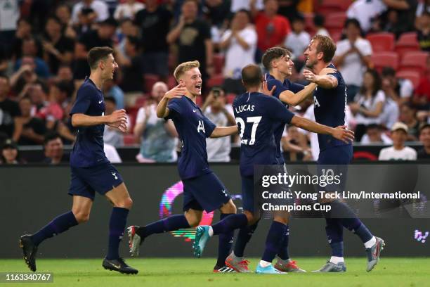 Harry Kane of Tottenham Hotspur celebrates scoring his side's third goal with his team mates during the International Champions Cup match between...