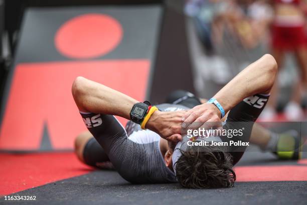 Sven Riederer of Switzerland reacts after taking 2nd place in Men's race of IRONMAN Switzerland on July 21, 2019 in Zurich, Switzerland.