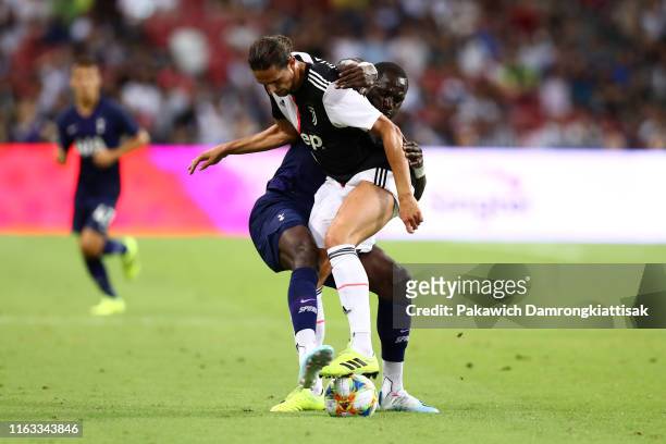 Adrien Rabiot and Moussa Sissoko of Tottenham Hotspur compete for the ball during the International Champions Cup match between Juventus and...