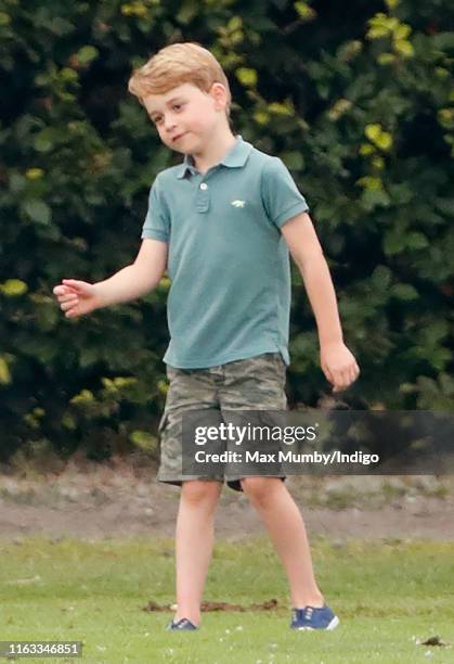 Prince George of Cambridge attends the King Power Royal Charity Polo Match, in which Prince William, Duke of Cambridge and Prince Harry, Duke of...