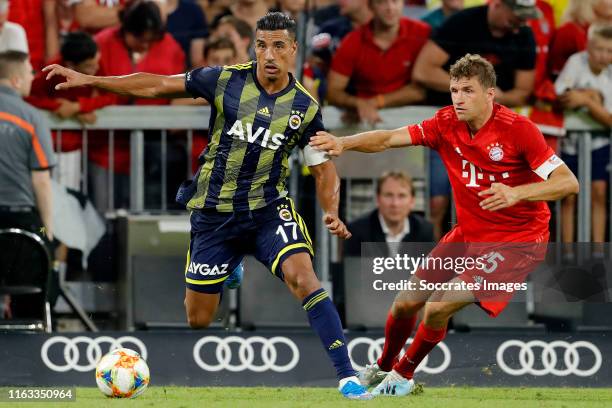 Nabil Dirar of Fenerbahce, Thomas Muller of Bayern Munchen during the Audi Cup match between Bayern Munchen v Fenerbahce at the Allianz Arena on July...