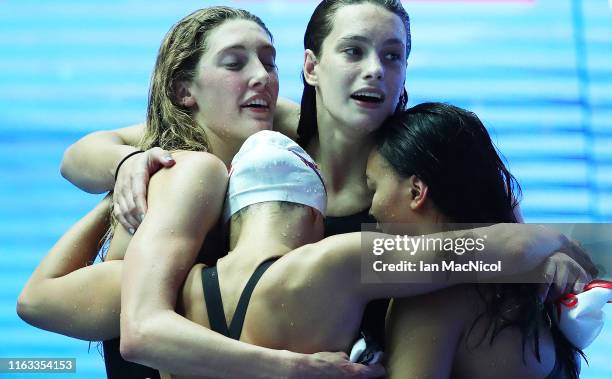 Taylor Ruck, Margaret MacNeil, Penny Oleksiak and Kayla Sanchez of Canada celebrate after taking third place in the Women's 4x100m Freestyle final...